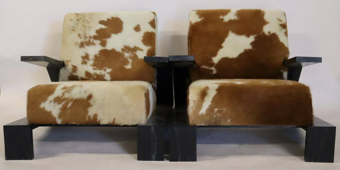 A Vintage Pr Of Ebonised Oak & Hide Upholstered: Arm Chairs. From an Westport CT Jersey estate. -Dimensions: 28.5" h x 34.5" w x 42.5" d