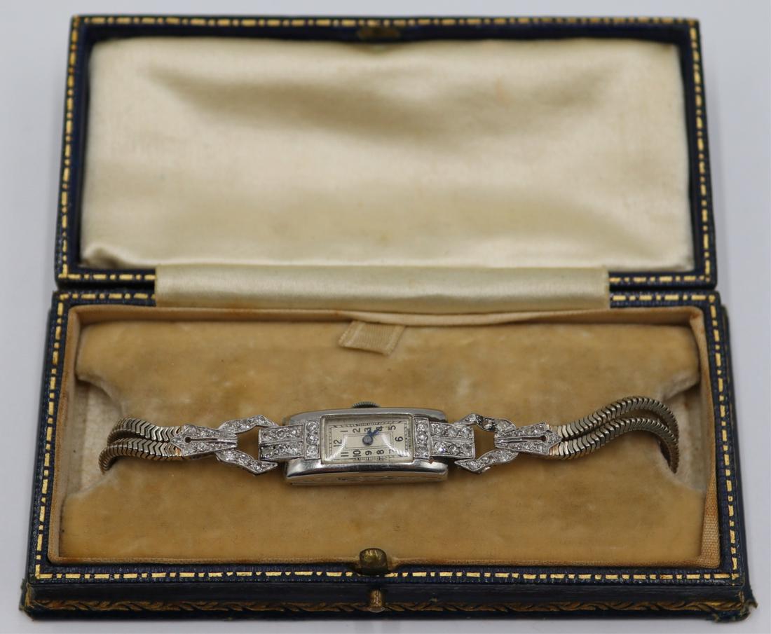 JEWELRY. Antique/Vintage Platinum and Diamond: Watch. Ladies antique/vintage platinum and single cut diamond watch face on a Chaincraft 9ct white gold watch bracelet. With a Swiss movement, 17 jewels. Interior of watch case stamped, "All Plat J456
