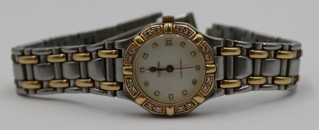 JEWELRY. Ladies Concord Saratoga Diamond Watch.: Ladies Concord Saratoga stainless steel and gold watch with diamond accents to bezel. Cream colored dial with diamond markers. Underside of watch case inscribed, "Saratoga 15 73 287/1 837624 Wate