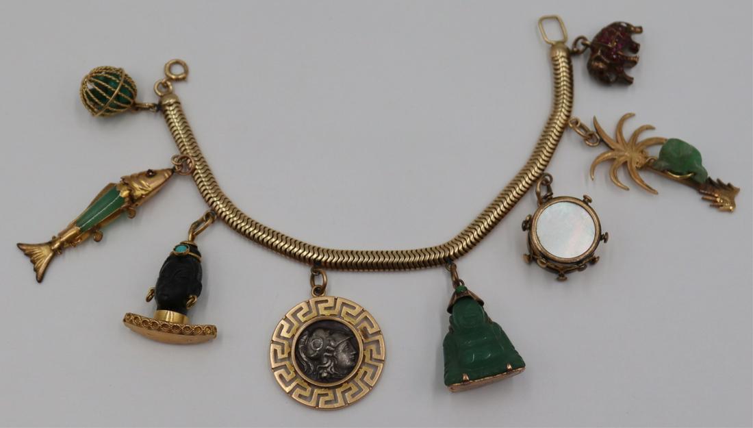 JEWELRY. 14kt Gold Charm Bracelet and (8) Charms. (1 of 13)