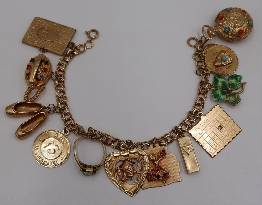 JEWELRY. 14kt Gold Charm Bracelet and (13) Charms. (1 of 9)