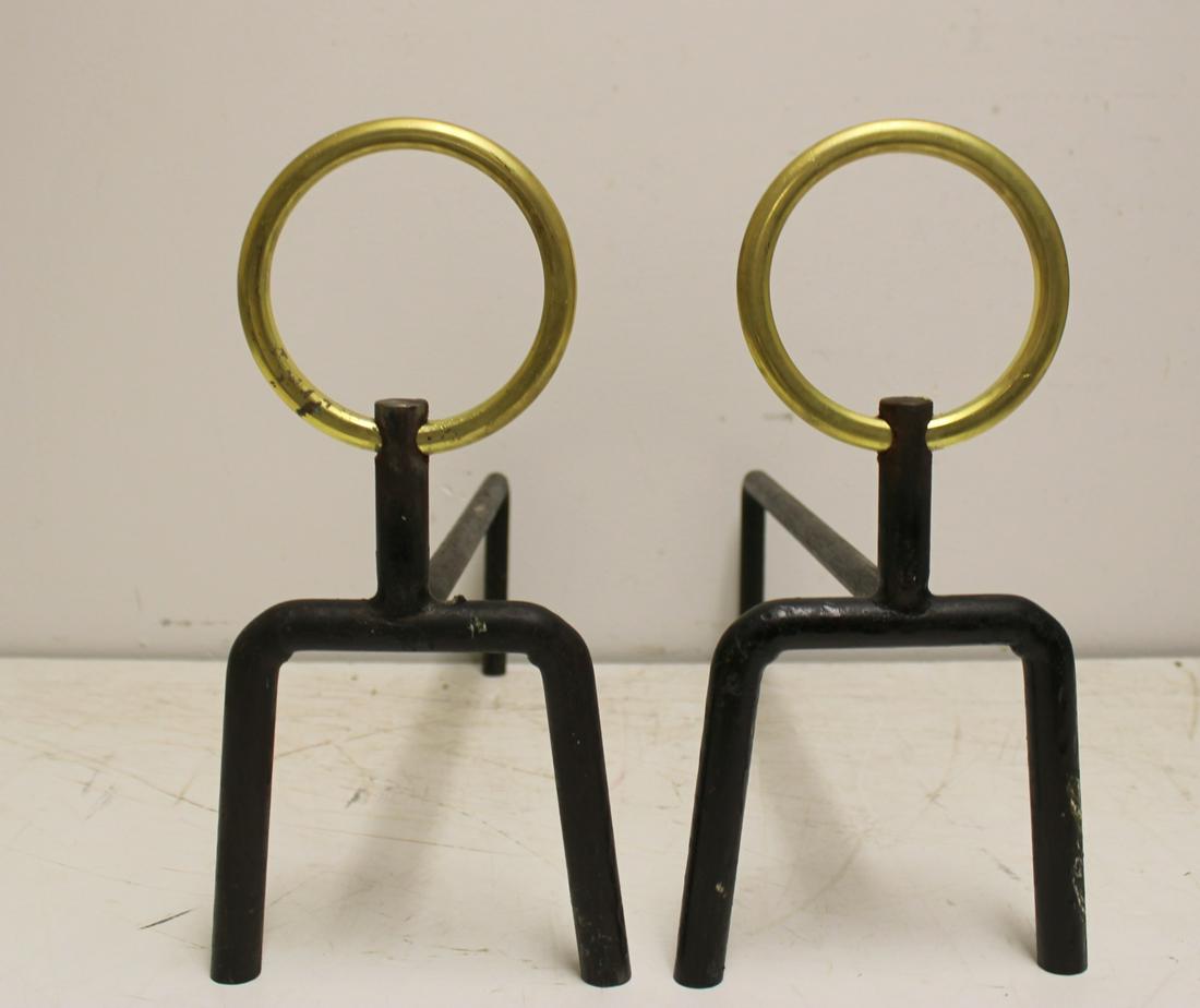 Art Deco Style Patinated And Gilt Metal: Andirons . From a fort Lee New Jersey home . - Dimensions: 15" x 7" x 19"