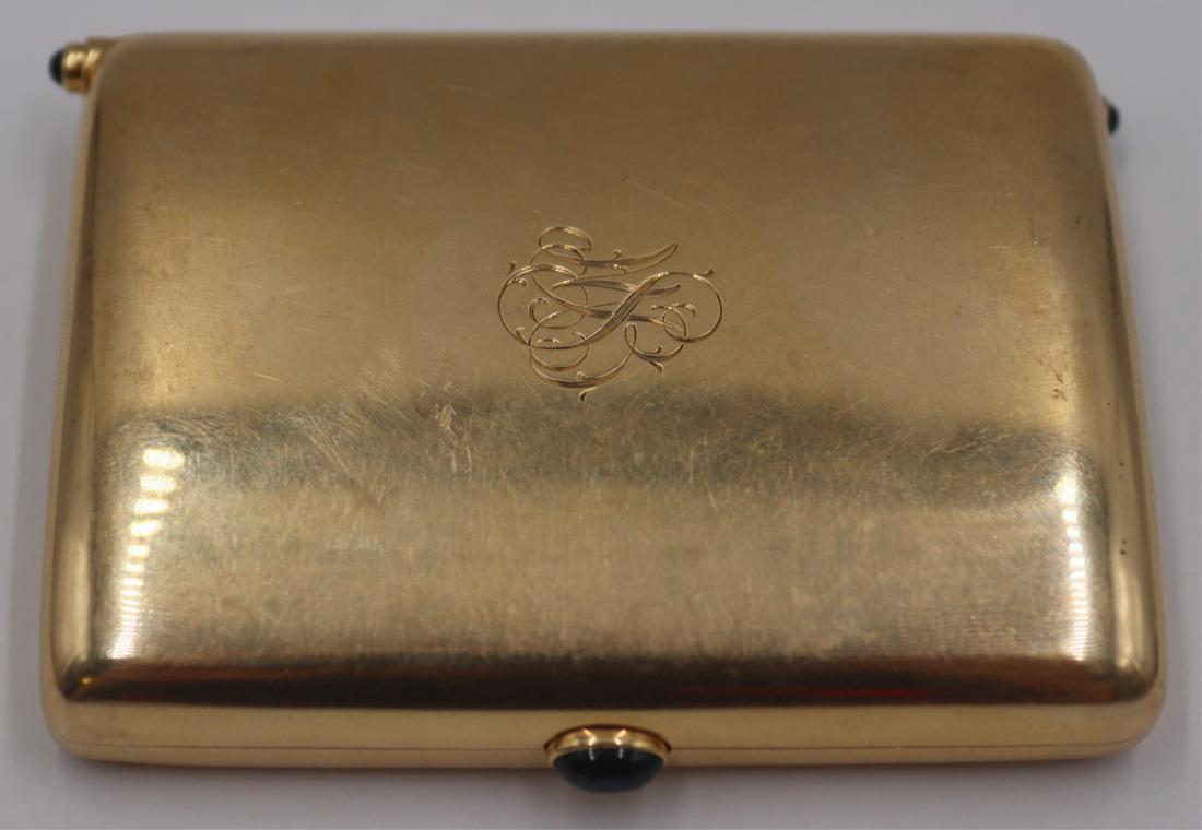 GOLD. Cartier 14kt Gold and Sapphire Hinged Case.: Monogrammed Cartier 14kt gold hinged case with sapphire cabochons. Stamped, "Cartier 14K 324". Total approx. weight is 58.7 dwt (gross). From a Darien, CT estate. Dimensions: case measures a