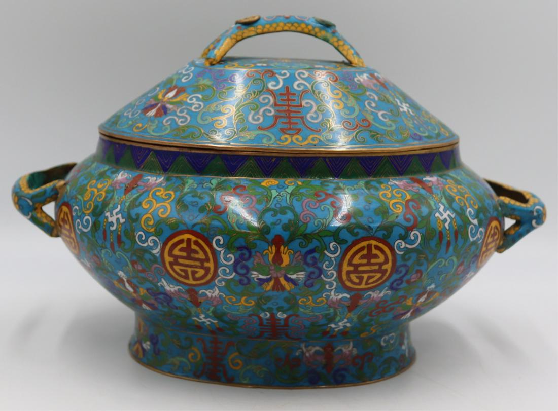 Chinese Cloisonne Covered Tureen.: Decorated with flowers, bats, and symbols. From a Briarcliff Manor, NY estate. Dimensions: tureen measures approx. 14.5" w x 10.25" d x 9.5" h.