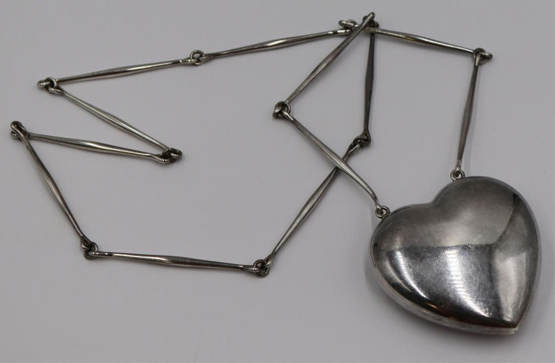 JEWELRY. Astrid Fog for Georg Jensen Puffy Heart.: Astrid Fog for Georg Jensen Danish sterling puffy heart pendant on chain, No. 126. Stamped, "Georg Jensen 925S Denmark 126". Total approx. weight is 3.33 troy oz (gross). From a White Plains