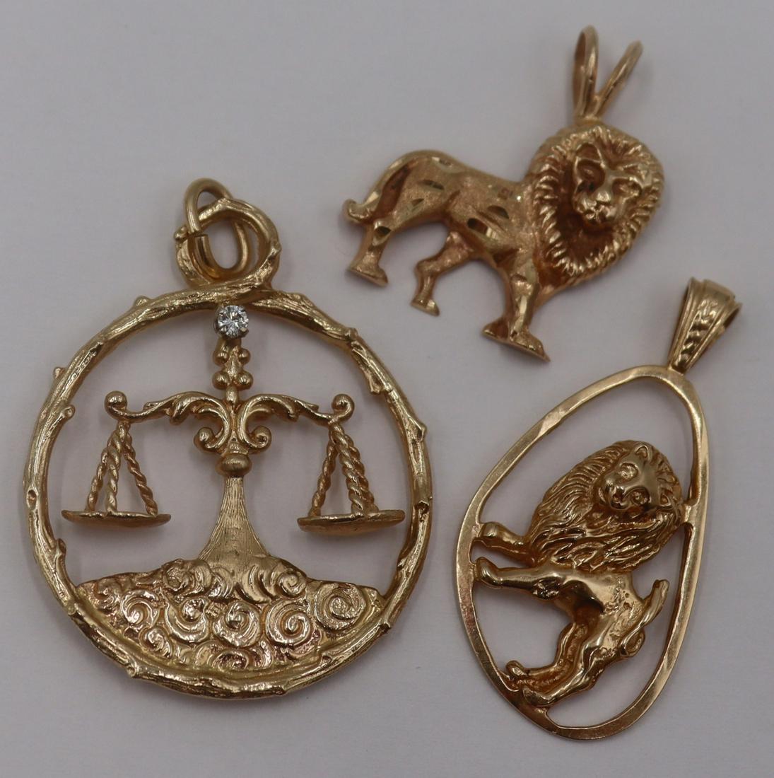 JEWELRY. Group of (3) 14kt Astrological Pendants.: Includes a 14kt yellow gold Leo lion form pendant in a shaped frame - stamped, "14k"; a second 14kt yellow gold Leo lion form pendant - stamped, "14k" verso; and a 14kt yellow gold