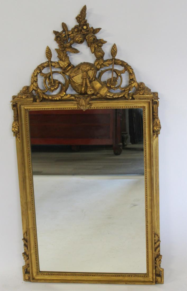 Antique Continental Carved And Giltwood Mirror.: Good large size with great carved crown. From a West Hampton Long Island NY estate. - Dimensions: 57" x 30"