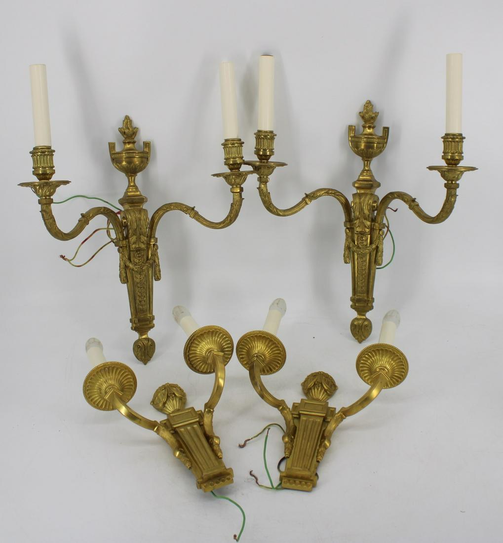 2 Pairs Of Vintage And Quality Gilt Bronze Sconces: One pair with 2 arm and urn finial and other 2 arm with flame finial. From a Bronxville NY estate. - Dimensions: 11" x 9.5" & 17" x 15"