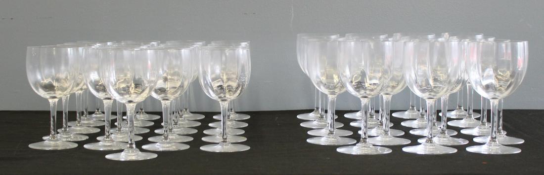 40 Pieces Of Signed Baccarat Stemware.: To include: 21 White Wine Glasses (6.5" h x 3.25") and 19 Red Wine Glasses (7" h x 3.5"). From a New Rochelle NY estate.