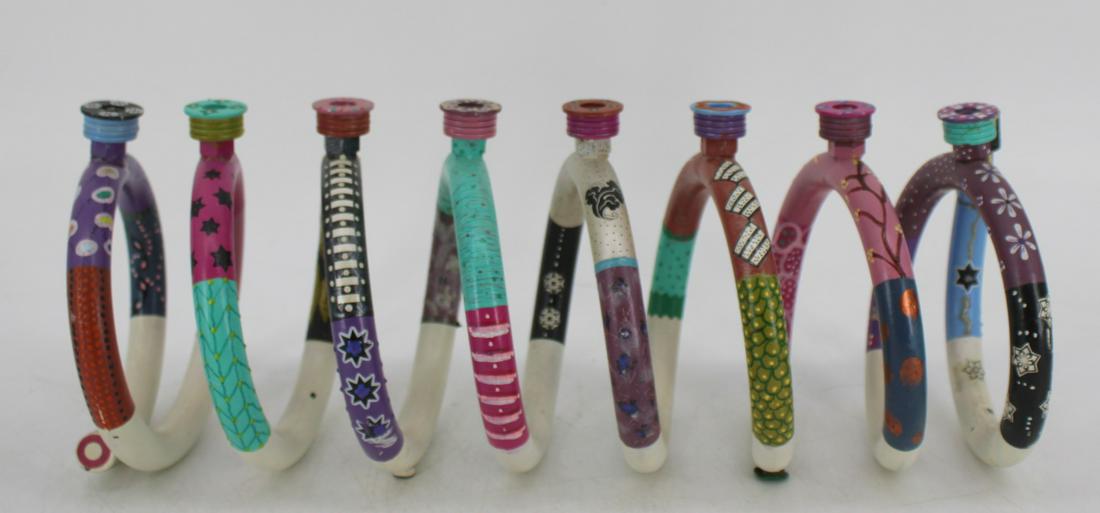 Howard Miller Signed Paint Decorated Menorah.: Possibly bronze. From a Nyack NY estate. - Dimensions: 16" x 6.25"