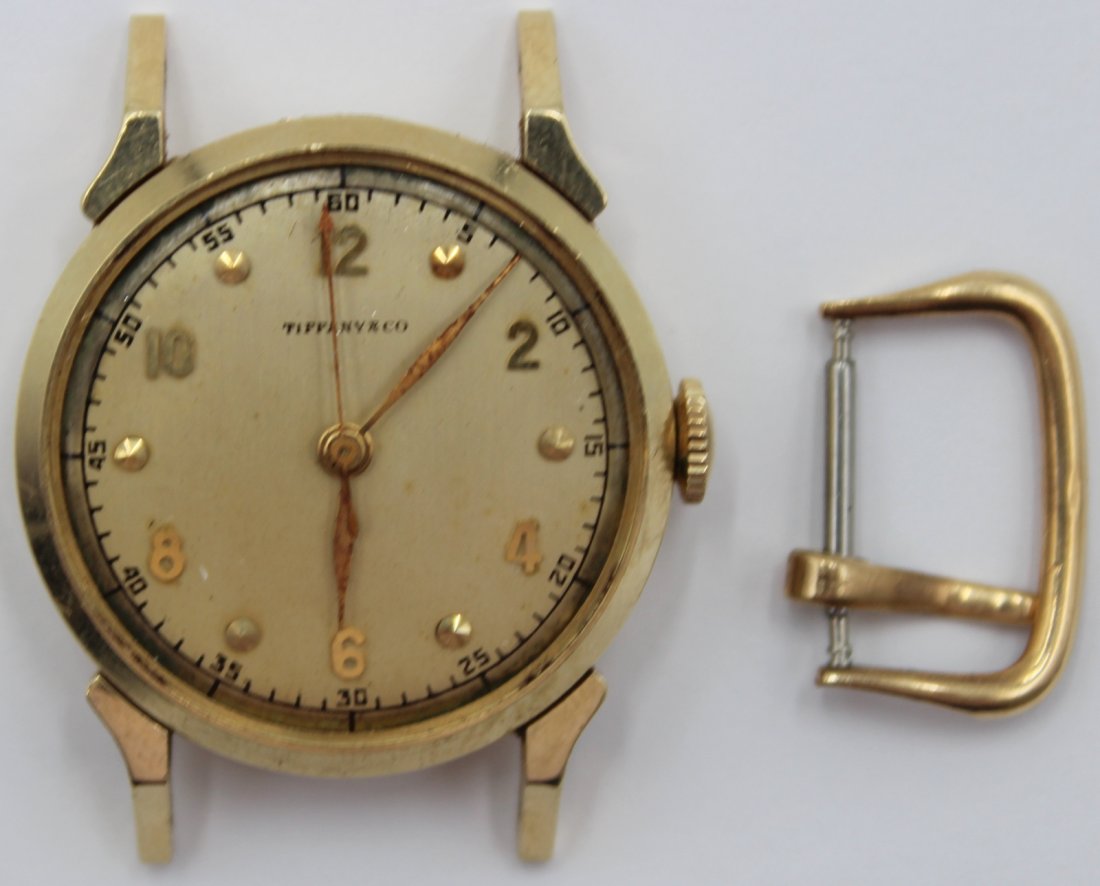 JEWELRY. Men's Tiffany & Co. Hamilton 14Kt Gold: Watch. A men's monogrammed Tiffany & Co. Hamilton 14kt yellow gold mechanical watch without crystal. This watch manufactured in approx. 1948 (based on serial#) features a 29mm (excluding crown) signed