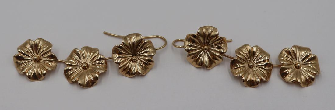 JEWELRY. Pair of 14kt Gold Floral Earrings.: Pair of 14kt yellow gold earrings comprised of (3) floral form pendants suspended from a single rod. Beautiful fluidity and movement to earrings. Apparently unmarked. The total approx. weight is 9.5 d