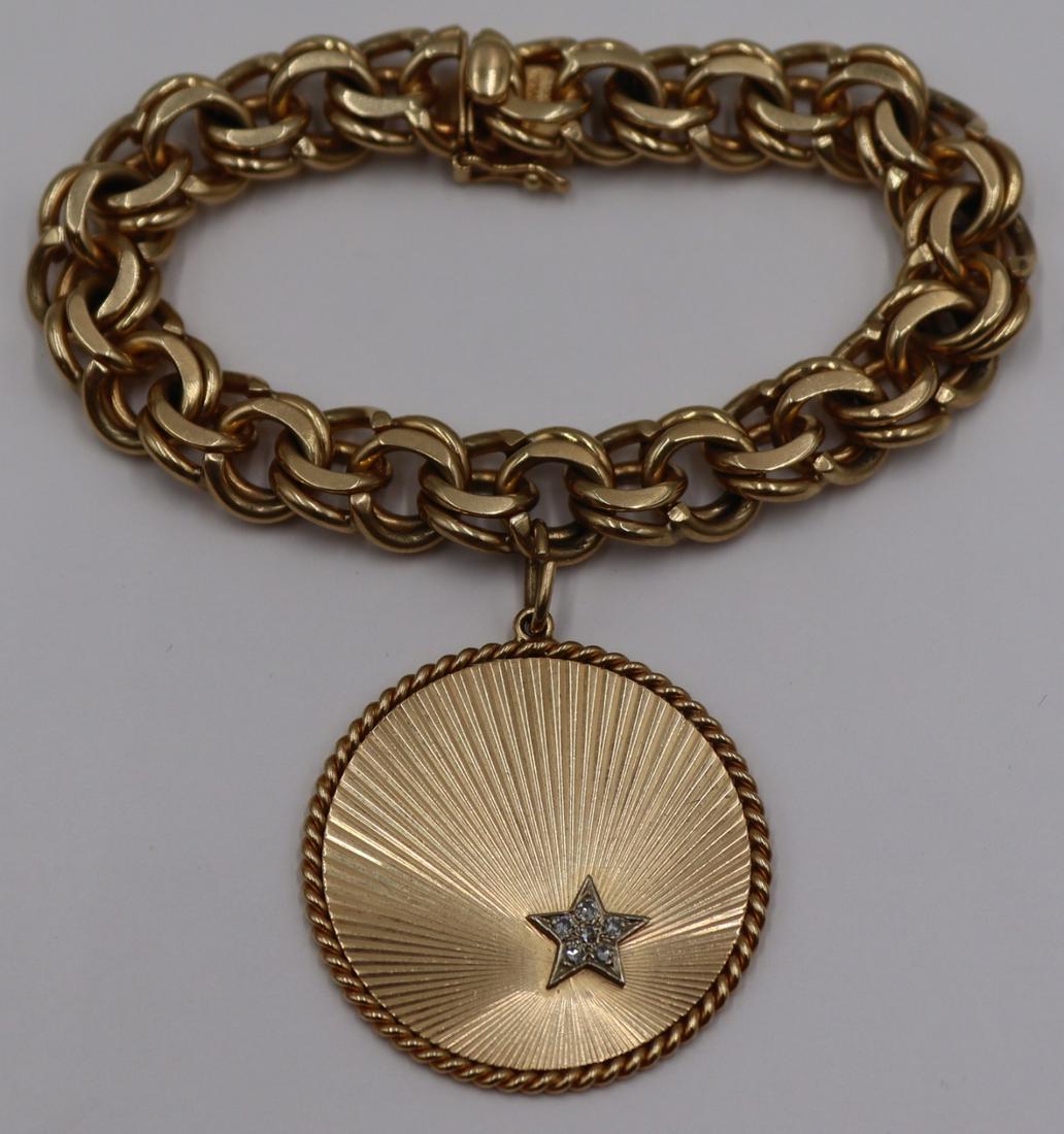 JEWELRY. Tiffany & Co 14kt Gold Bracelet and Charm: Vintage 14kt yellow gold multi-link charm bracelet - stamped, "Tiffany & Co Succo 14K". Accompanied by a signed Tiffany & Co. circular 14kt yellow gold oversized charm inlaid with a 