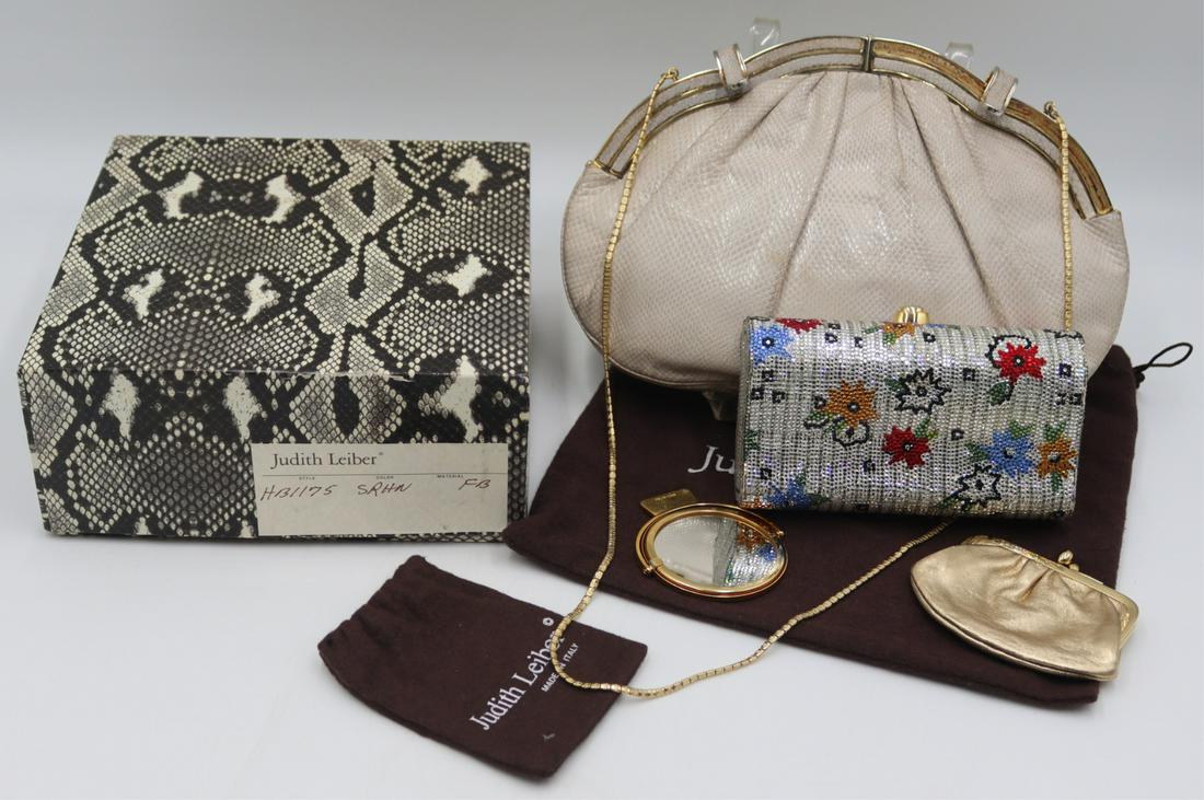 (2) Judith Leiber Minaudieres.: Includes a Judith Leiber floral decorated crystal minaudiere or rectangular clutch - with snap closure and hinged drop-in chain strap; original box, "Style HB 1175 Color SRHN Material FB", c