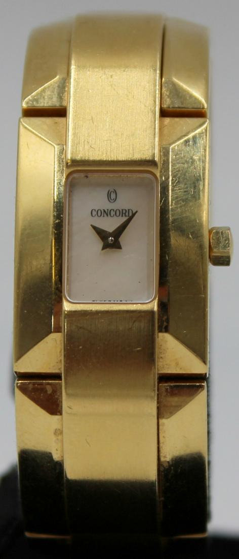 JEWELRY. Lady's Concord La Scala 18kt Gold Watch.: A ladies Concord La Scala 18kt yellow gold quartz watch. This watch features a 18.5mm (excluding crown) 18kt yellow gold rectangular watch case, sapphire crystal, mother-of-pearl dial, gold tone Dauph