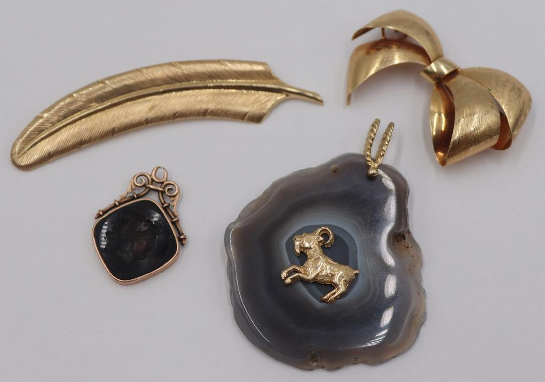 JEWELRY. 14kt Gold Jewelry Grouping.: Includes a 14kt yellow gold feather form brooch - stamped, "14k"; a German 14kt yellow gold bow form brooch - stamped. "14kt Germany"; a Victorian 14kt rose gold and intaglio spinn