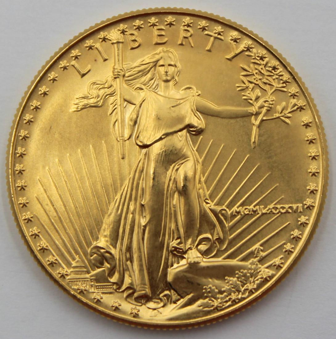 BULLION. 1986 $50 1 oz Gold American Eagle Coin.: A 1986 (Philadelphia) struck 1 troy ounce gold American Eagle coin struck in .9167 fine gold. The total mintage for this date & mint mark is: 1,362,650. Total approx. weight is 1.091 troy oz (gros