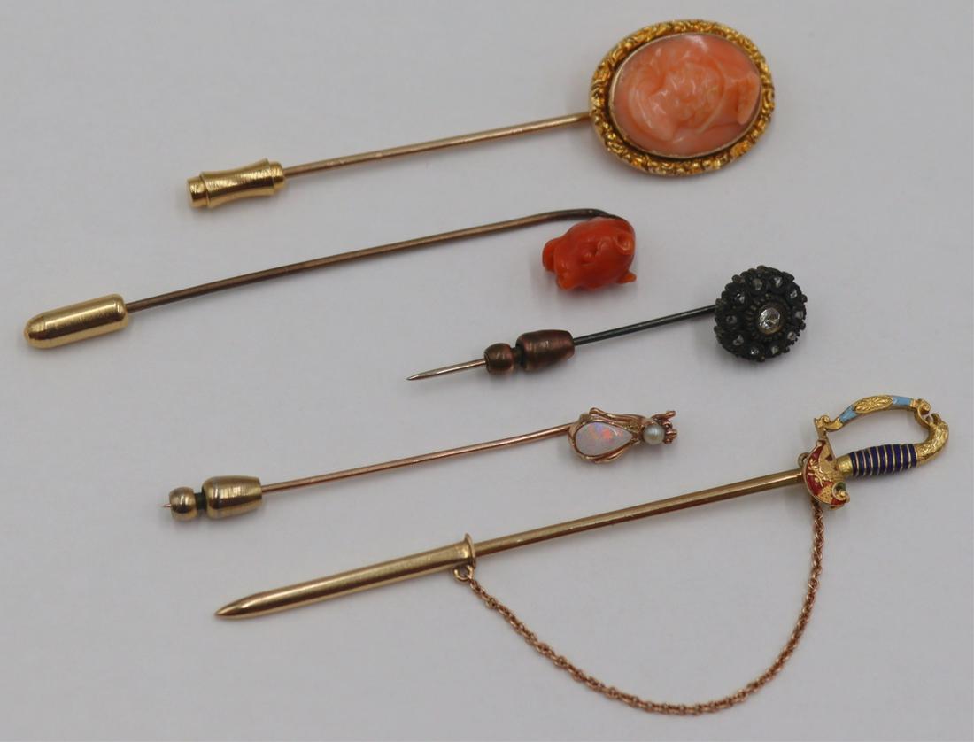 JEWELRY. (5) Antique/Vintage Gold Stick Pins.: Includes a 14kt gold and carved coral stick pin of a bust with hat; a possibly Grand Tour carved coral 10kt gold stick pin of a panther; a 14kt gold and diamond stick pin; a 14kt gold insect form stic