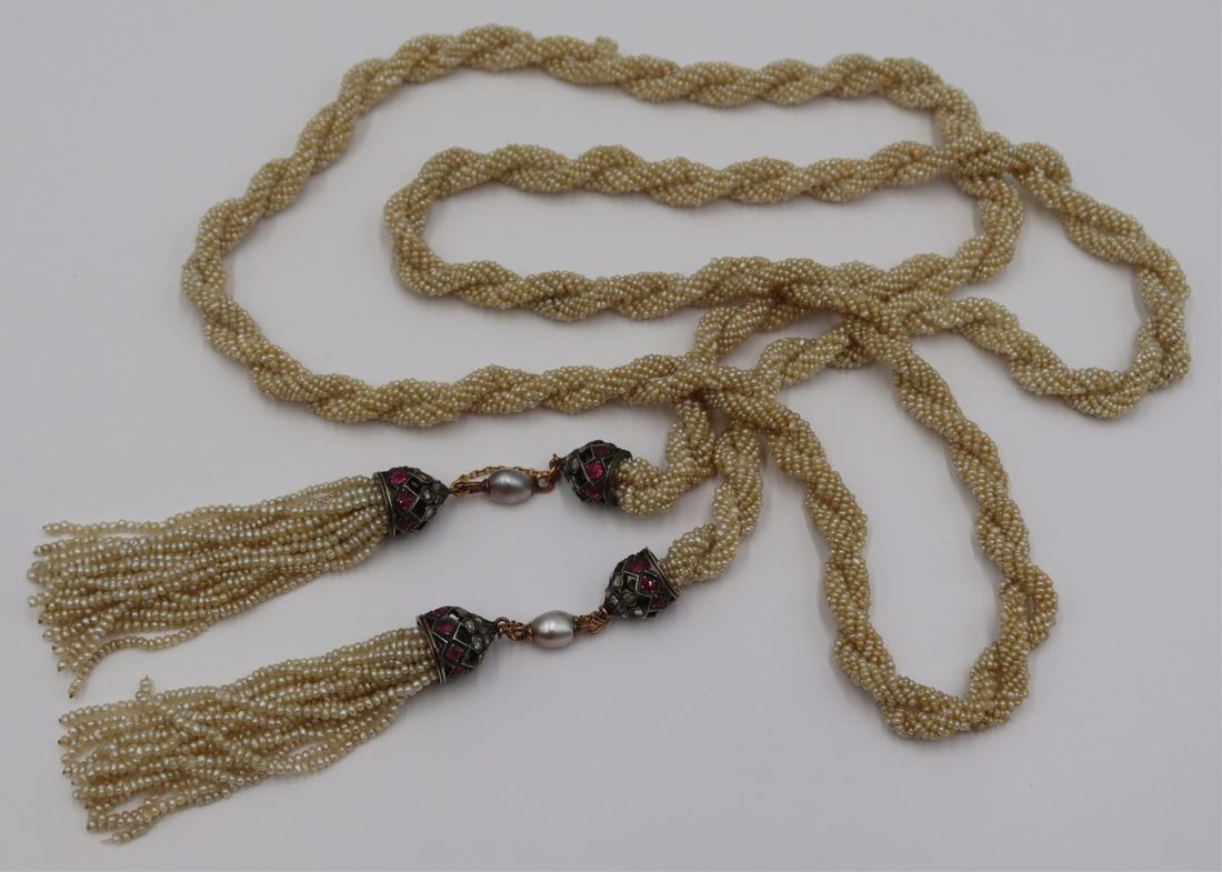 JEWELRY. Art Deco Seed Pearl Rope Necklace.: Art Deco seed pearl rope sautoir necklace terminating in rose cut diamond and faceted colored gem, most surely ruby, caps or mounts flanked by semi-baroque pearls and suspending seed pearl tassels. Pe