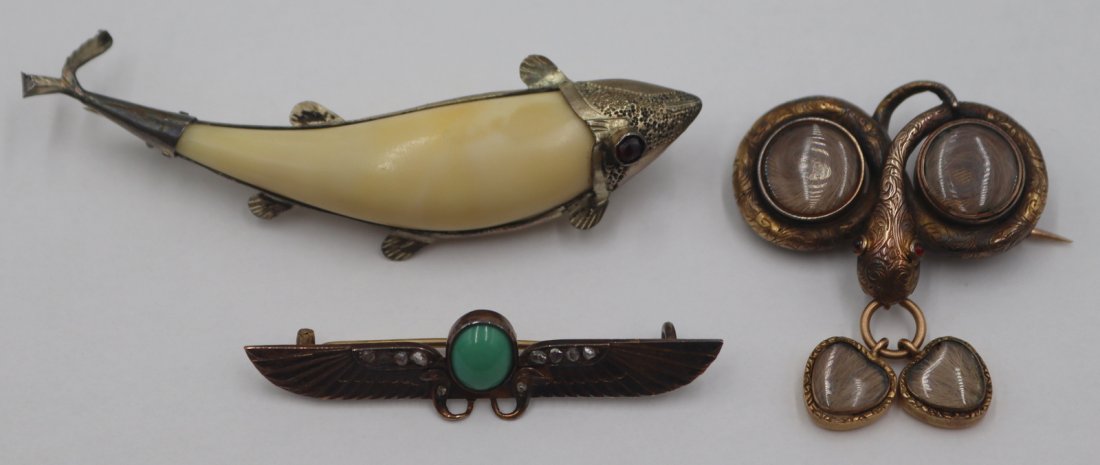 JEWELRY. (3) Antique/Vintage Figural Brooches.: Includes a Victorian 14kt gold engraved coiled snake form brooch with garnet? cabochon eyes and suspending (2) heart form hair lockets - inscribed verso, "E.B.B. Born Aug. 21 1841, G.E.B. Born Jan 26 