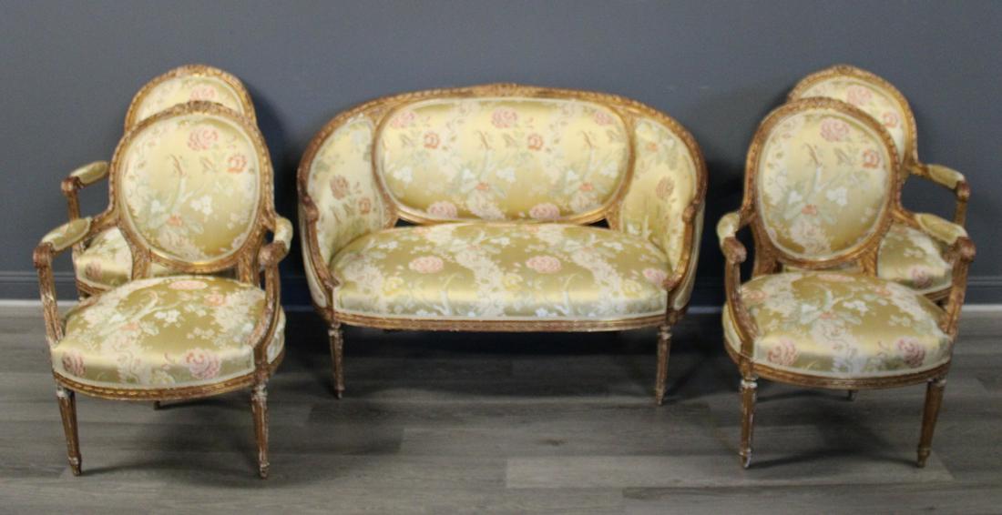 Antique & Fine Quality 5 Piece Louis XV1 Style: Carved & Gilt parlor Set. Nicely carved with Scalamander fabric to include: a settee (24.25" h x 50.75" w x 27" d), and 4 arm chairs (37" h x 27" w x 17" d). From a G
