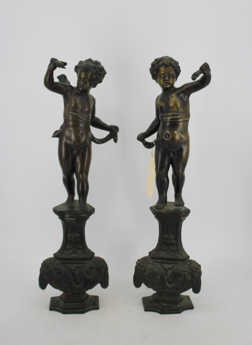Pr Of Large Antique Cherubs Standing On Rams Heads: Nice quality, well executed and might have been Andirons at some stage. Measurements: 26"h