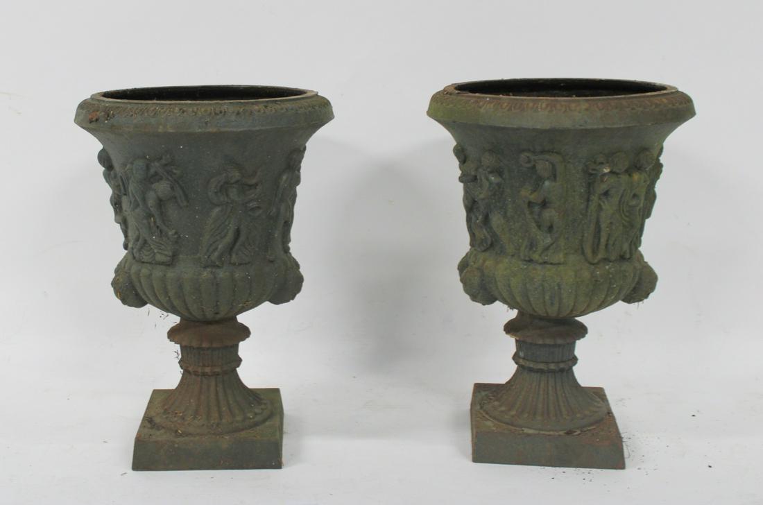 An Ornate Pair of Patinated Cast Iron Urns. (1 of 4)