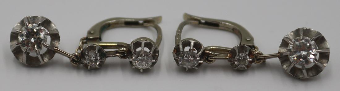 JEWELRY. Pair of 14kt Gold and Diamond Earrings. (1 of 7)