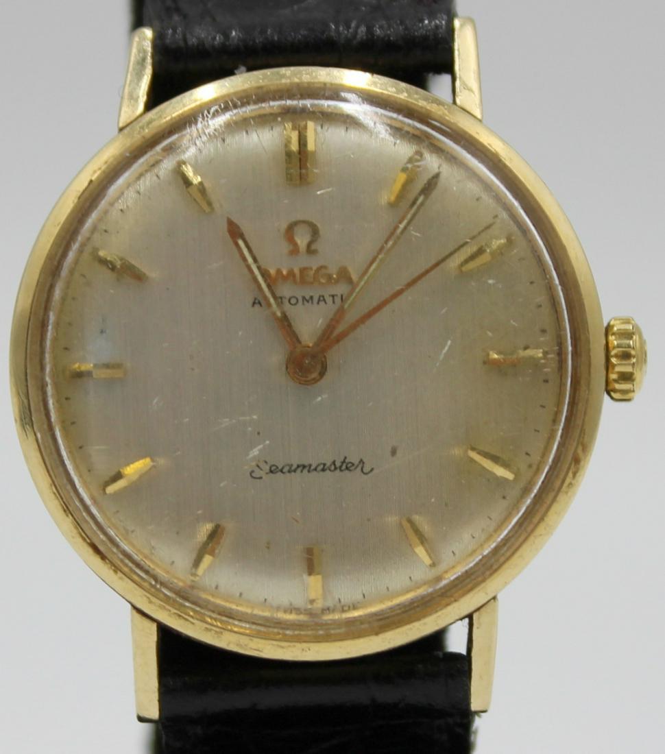 JEWELRY. Men's Omega Seamaster 14kt Gold Watch. (1 of 12)