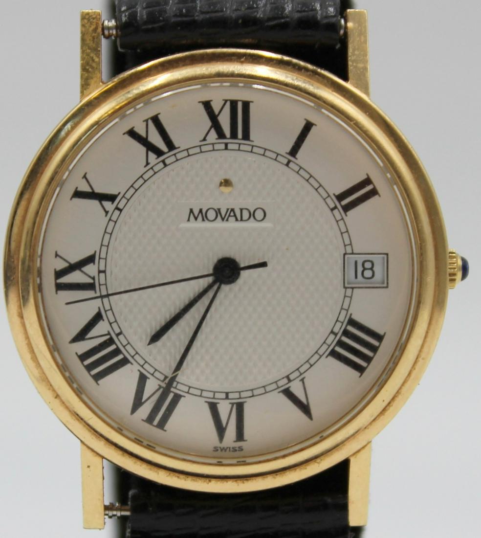JEWELRY. Men's Movado 14kt Gold Quartz Watch.: A men's Movado 14kt gold quartz watch. This watch by Movado features a 32mm 14kt yellow gold round watch case, sapphire crystal, white textured dial, Roman numeral hour markers, black hands, date wind