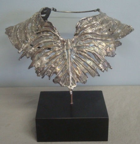 BROWN, Judith. Silver-Toned Metal Butterfly Collar: Initialed verso. Provenance: Purchase, NY estate. Dimensions: 6" high x 9" wide plus base. Condition: Good.