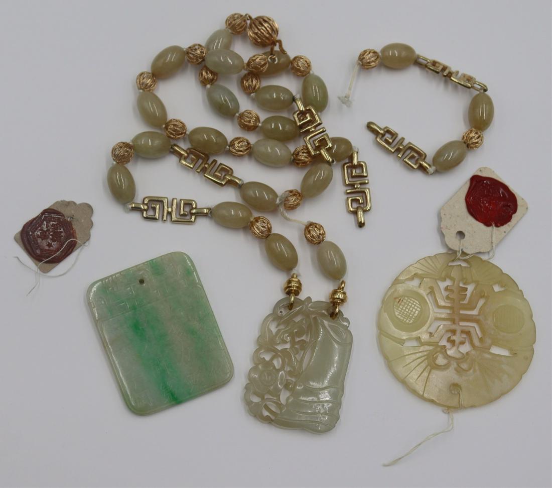 Grouping of (3) Jade Pendants. (1 of 12)