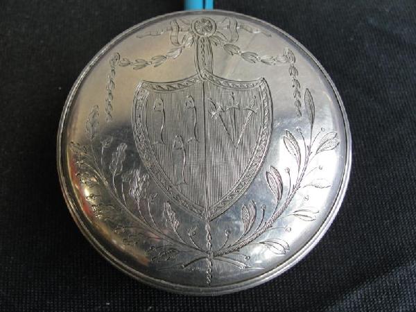 STERLING. Irish Georgian Freedom Box.: With Dublin hallmarks and a Makers mark I.K, possibly James Keating. Gilt Interior. Finely engraved Family Arms of Mullets and Three Swords on lid with possibly Dublin City Arms and Crest on base. Fro
