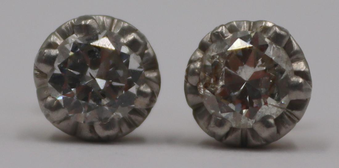 JEWELRY. Pair of 0.50ct+ Diamond Stud Earrings. (1 of 3)