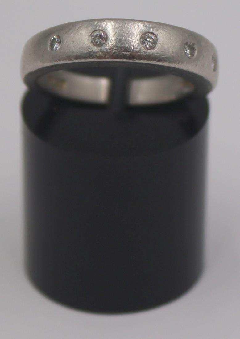 JEWELRY. Platinum and Diamond Band Ring. (1 of 5)