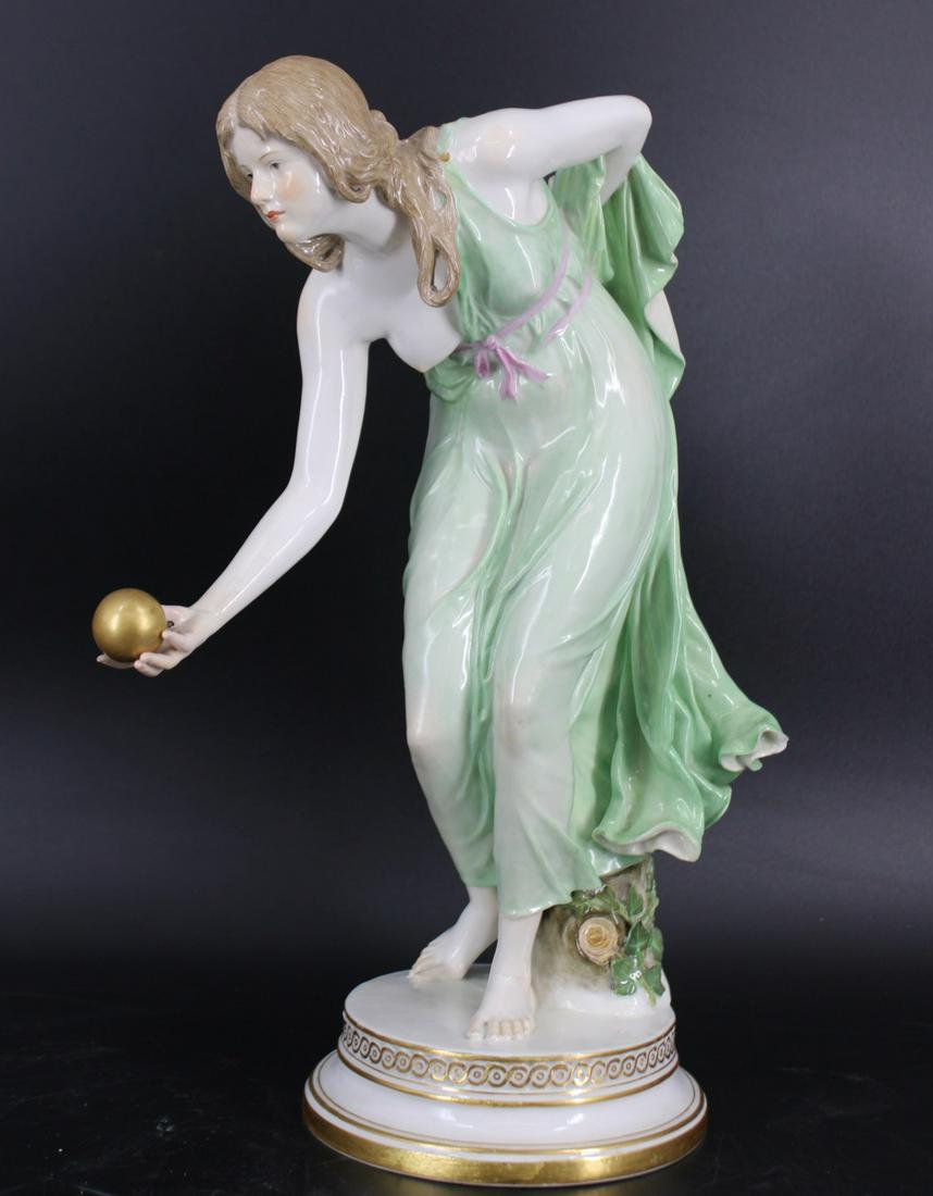 Meissen Polrcelain Figure Of A Lady playing Ball: Signed on base and from a Great Neck Long Island NY estate . - Dimensions: 14"H