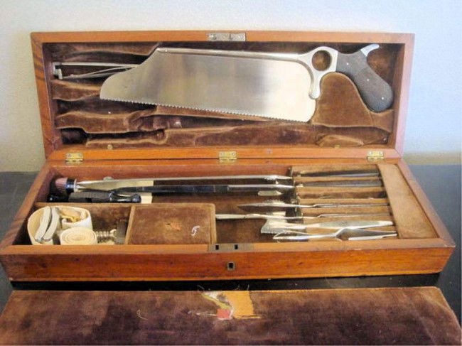 Civil War (?) Confederate Doctors Kit in Original: Fitted Locking Mahogany Purchased in New Orleans. We have been alerted to the possibility that this may be a good quality reproduction. Box engraved CSA on brass plaque. With key. From the personal co