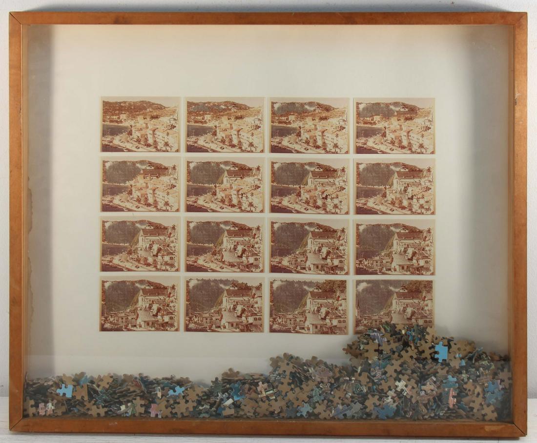AL SOUZA (AMERICAN, b. 1944).: 16 color photographs and puzzle parts in a wood and glass box. "Corsica-Hallstatt Puzzle". 1978. O.K. Harris label affixed verso. From a Long Island, NY collection. - Dimensions: 24.25" high