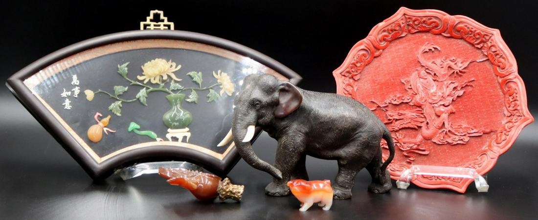 Grouping of Antique/Vintage Asian Objects.: Includes a signed bronze elephant with carved bone tusks - signed to underside; a signed carved cinnabar dish with central depiction of a Quanyin - signed to underside; a carved Carnelian pug - losses