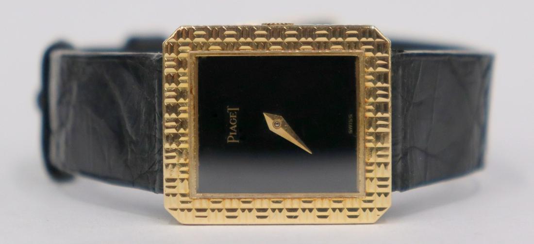 JEWELRY. Lady's Piaget 18kt Gold Mechanical Watch. (1 of 18)