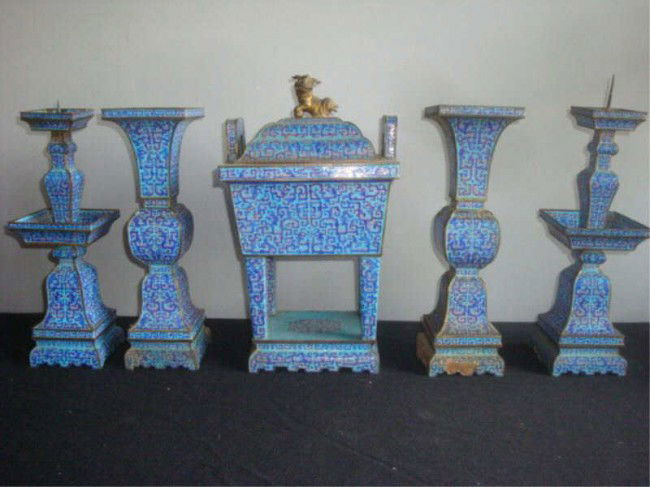 19th C. Chinese Enameled 5-Piece Garniture Set.: Purchased by the consignor's mother c.1938 in San Francisco, possibly at Gump's. From a Larchmont home. Dimensions: Urn is 16" h, vases and prickets 14" h Condition: losses, especially around bases, o