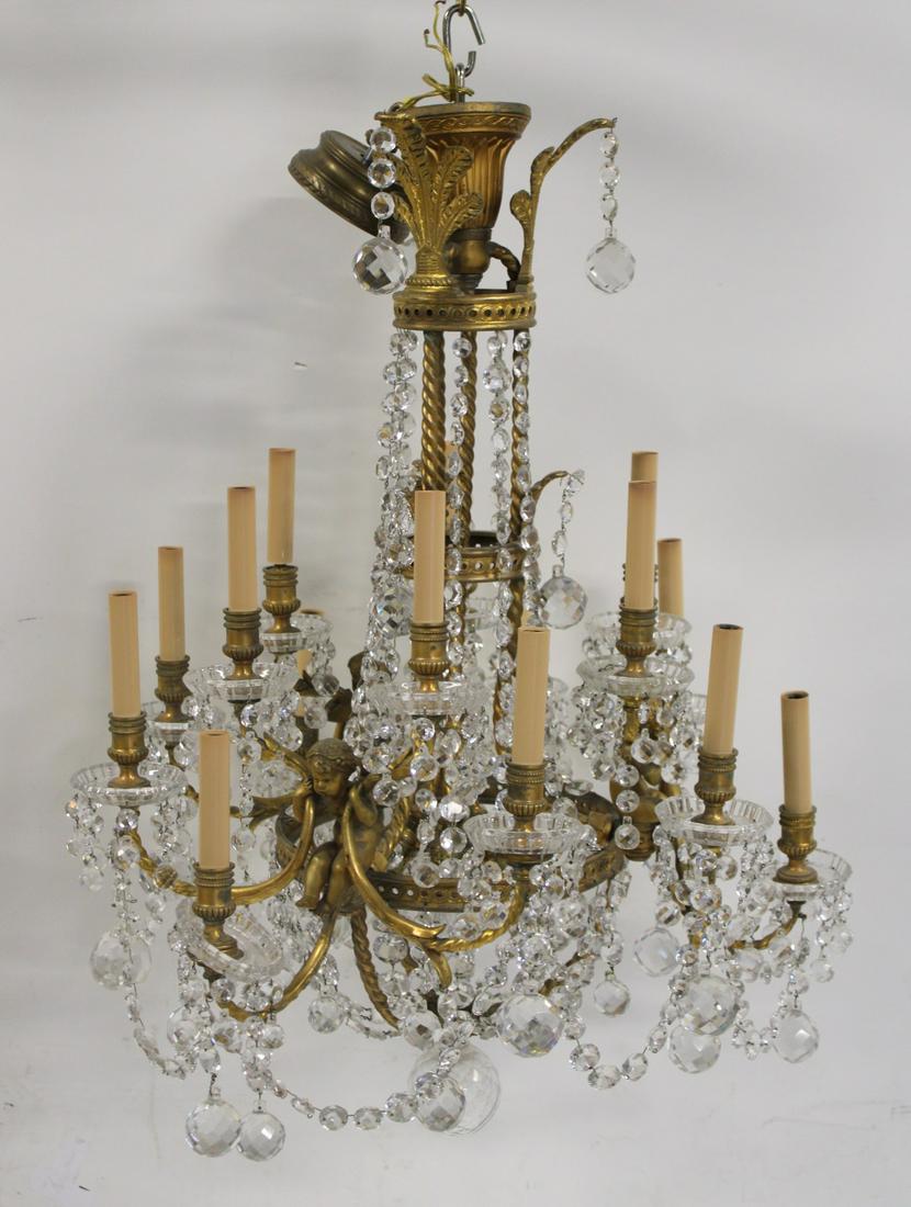 BACCARAT. Gilt Bronze Crystal Chandelier.: Good large size with great patina and Cherubs. Signed Baccarat on bobeches. From a Long Island NY estate. - Dimensions: 34" x 24"W