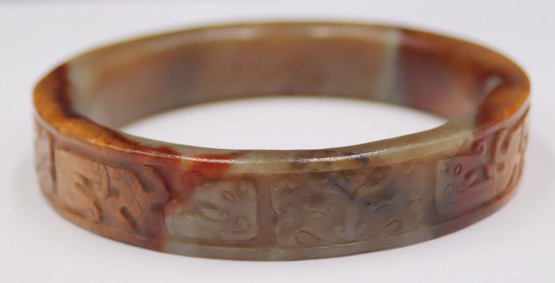 JEWELRY. Carved Archaic Style Incised Jade Bangle. (1 of 9)