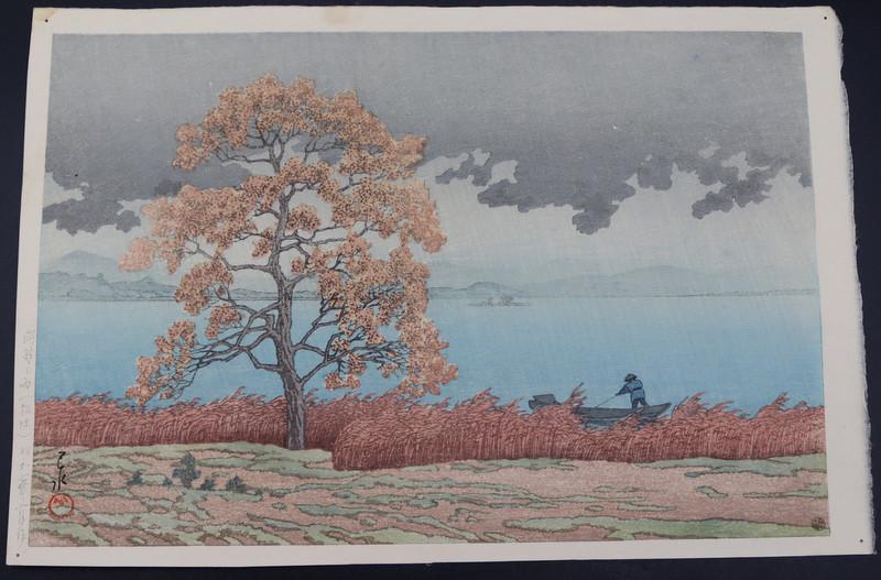 HASUI KAWASE (Japan, 1883-1957).: Hasui Kawase Japanese woodblock print, "Lakeside Shower, Matsue". Unframed. From a Hartsdale, NY estate. Dimensions: overall dimensions of approx. 10.375" h x 15.5" w.