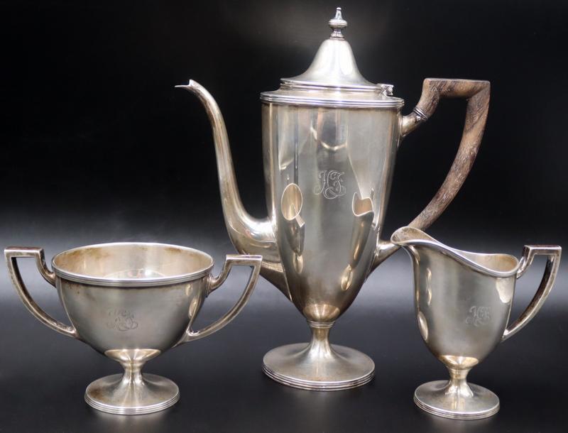 STERLING. 3 Pc. Tiffany & Co. Sterling Tea Service: Tiffany & Co. monogrammed sterling tea service including a teapot, creamer, and sugar. Total approx. weight of all items is 29.41 troy oz (gross). From a Hartsdale, NY estate. Dimensions: teapot m