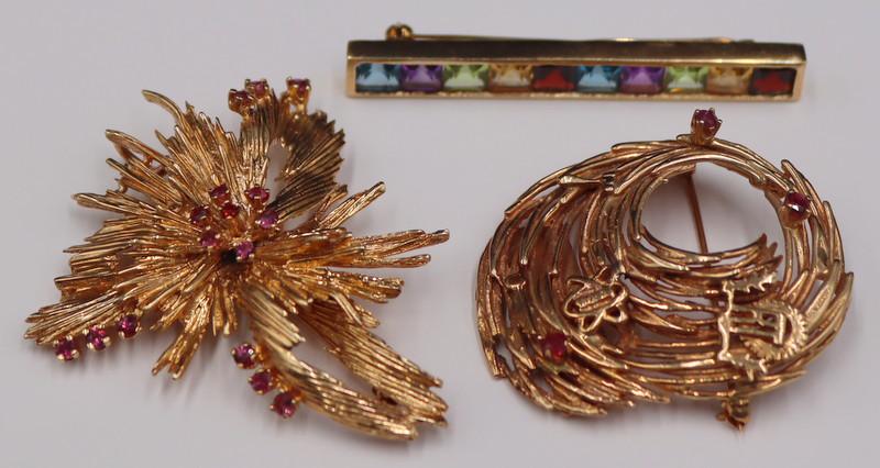 JEWELRY. (3) 14kt Gold and Colored Gem Brooches.: Includes a signed 14kt yellow gold bar pin displaying a central panel of (10) faceted colored gems - stamped verso, "585" alongside an unidentified maker's mark of, "W?"; a 14kt ye
