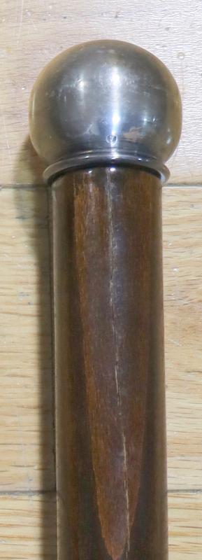 SILVERPLATE. French System Cane Walking Stick.: A French Roux - Marquiand of Lyon? system cane walking stick. With a hollow wood shaft with a silver plated corkscrew pommel with partial maker's mark, (3) approx. 2.3" silver plated hollow cylin