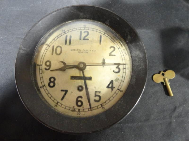 Clock. Signed Chelsea, Boston.: From a Queens, NY estate. Dimensions: 7" dia. x 3.5" deep.
