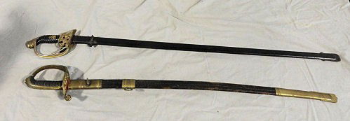 2 Swords / Sabers / Bayonets with Scabbards.: 1 is 35.5" overall and Austrian, signed "Tiller & Co., Wien" and "Stiftskaserne" (?) on one side near grip and "Weyersberg . Kirschbaum & Co. Solingen" on the other side. 2nd one is 33" long overall w