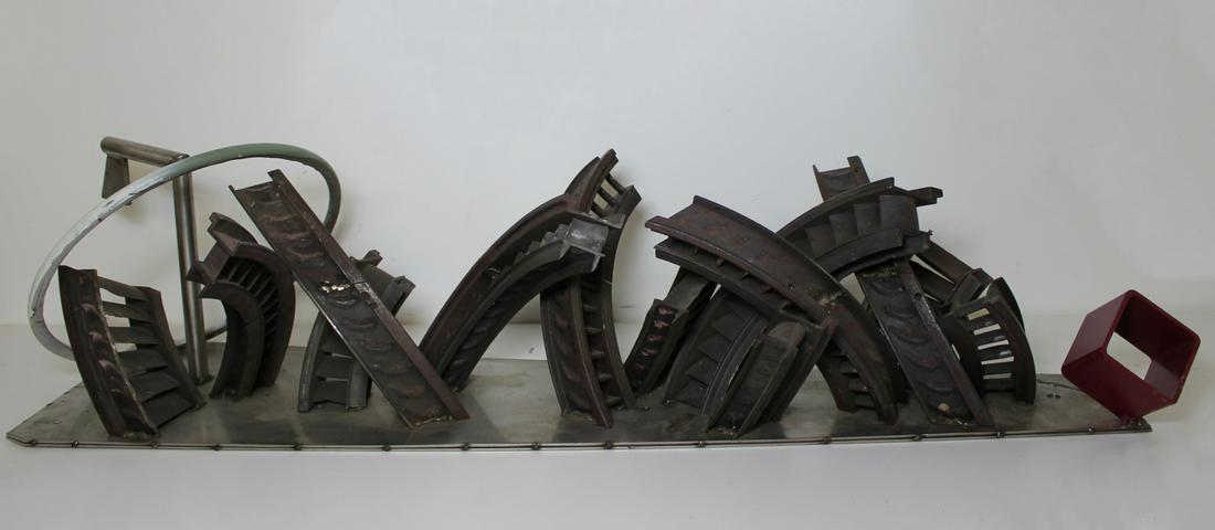 D. PHILLIP (20TH CENTURY).: Brutalist Metal Sculpture. Signed to rear right corner. - Dimensions: 10.5" h x 40" w x 10.5" d.
